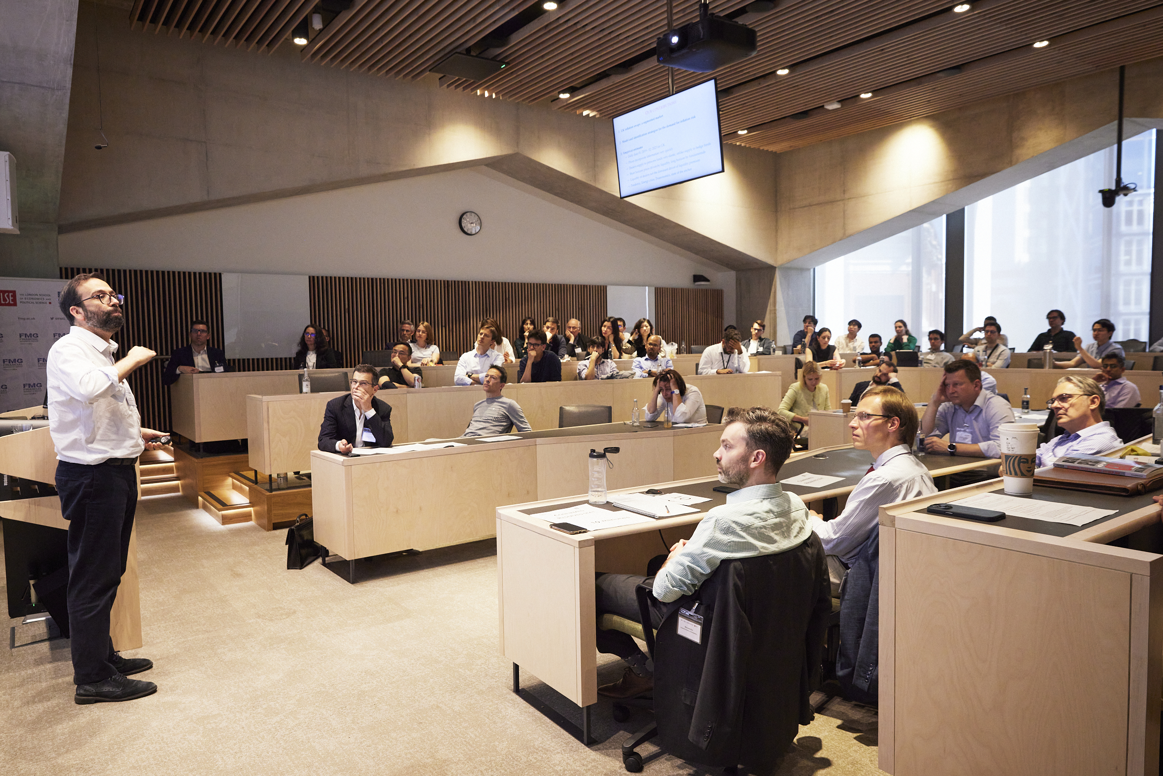 Conference room with Ricardo Reis presenting