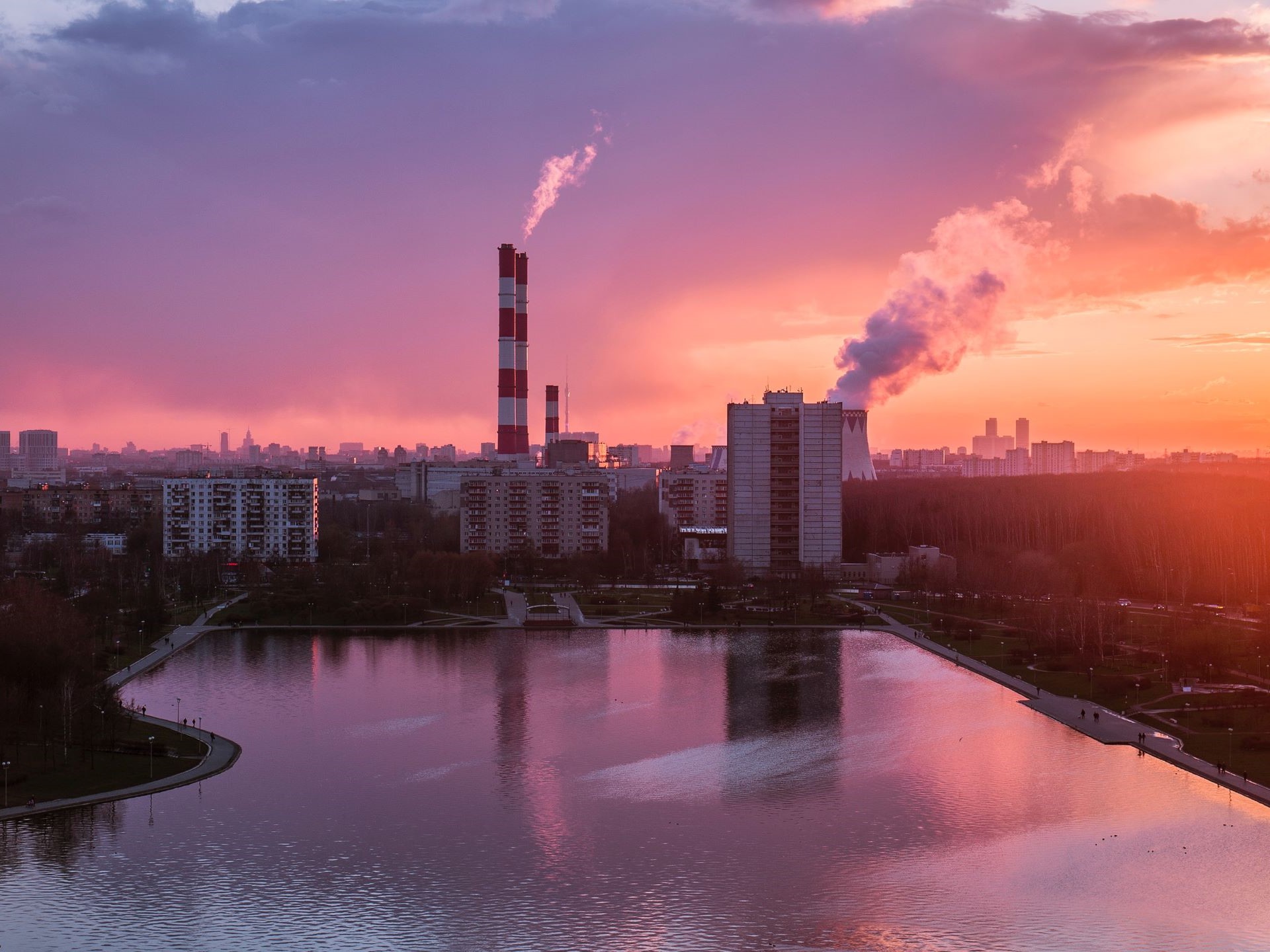 factories against sunset background