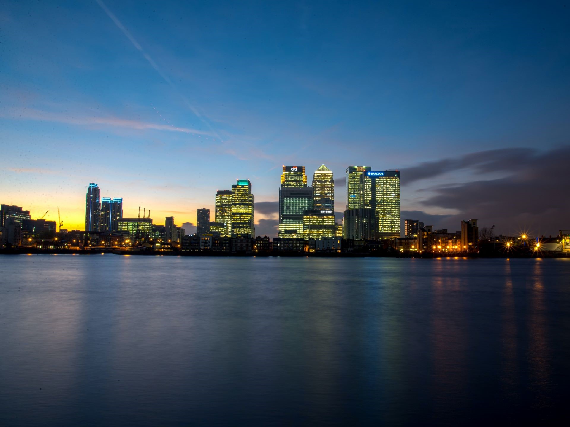 office buildings against sunset background