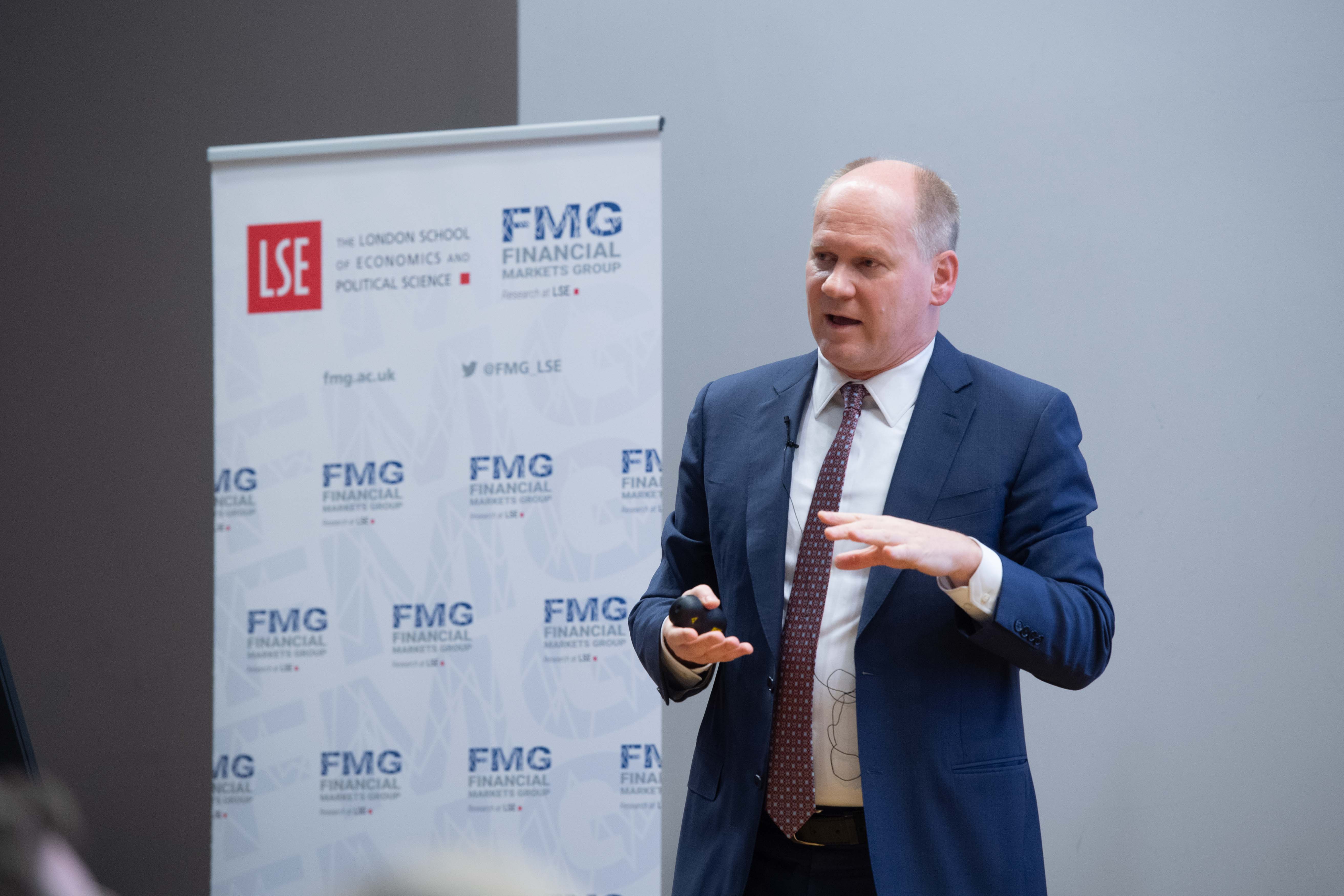 Lubos Pastor giving lecture