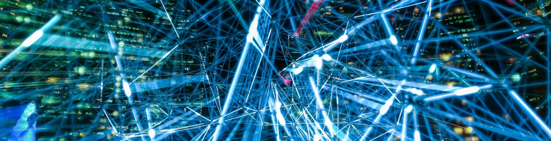 A web or network overlapped onto high rise buildings