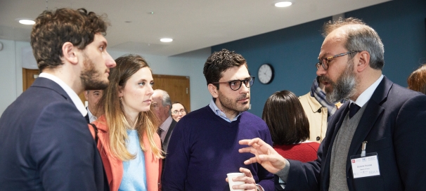 group of conference attendees discussing