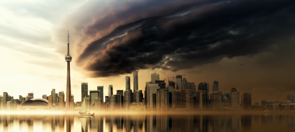 Image of tornado approaching a horizon of skyscrapers