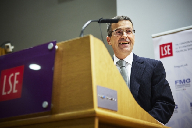 Dimitri Vayanos speaking from lectern