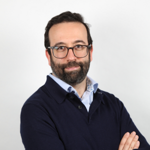 Profile photo of Ricardo Reis, white male, dark hair, dark eyes, wearing beard and glasses